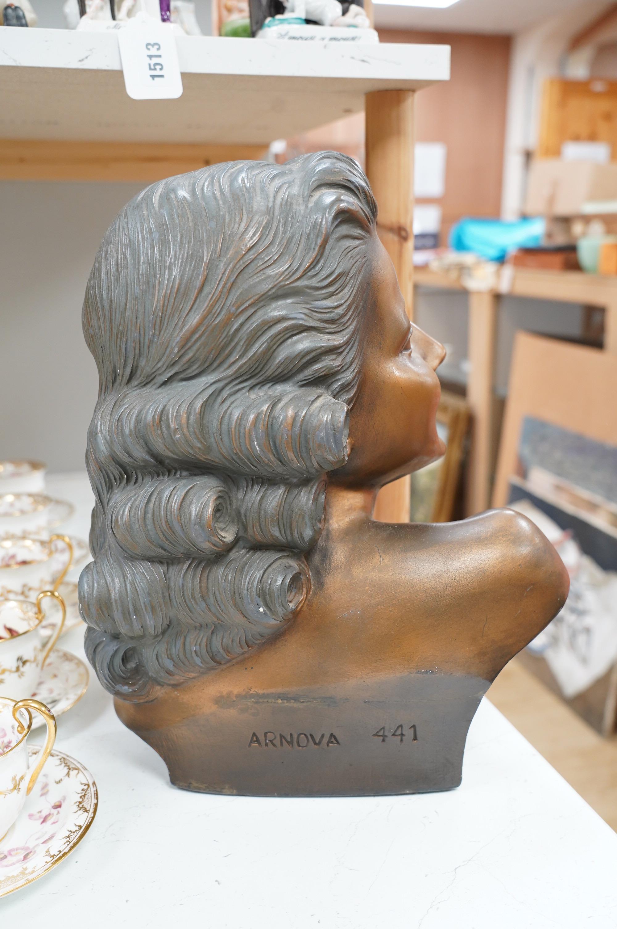 An Art Deco Arnova bust of a woman, numbered 441, 40cm high. Condition - fair, some chips